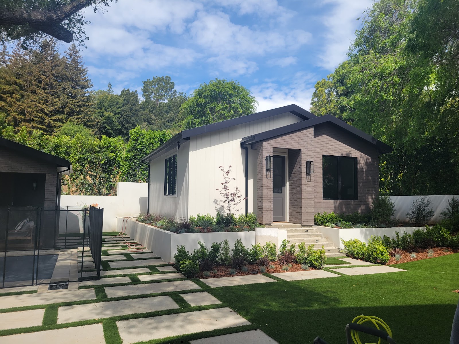 Rear lawn and terrace of the Brentwood custom home
