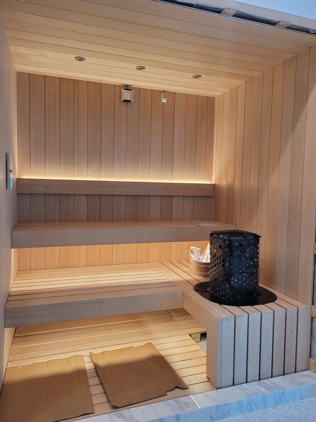 Cedar bench detail inside the sauna — Boca de Canon custom home build in Brentwood, Los Angeles