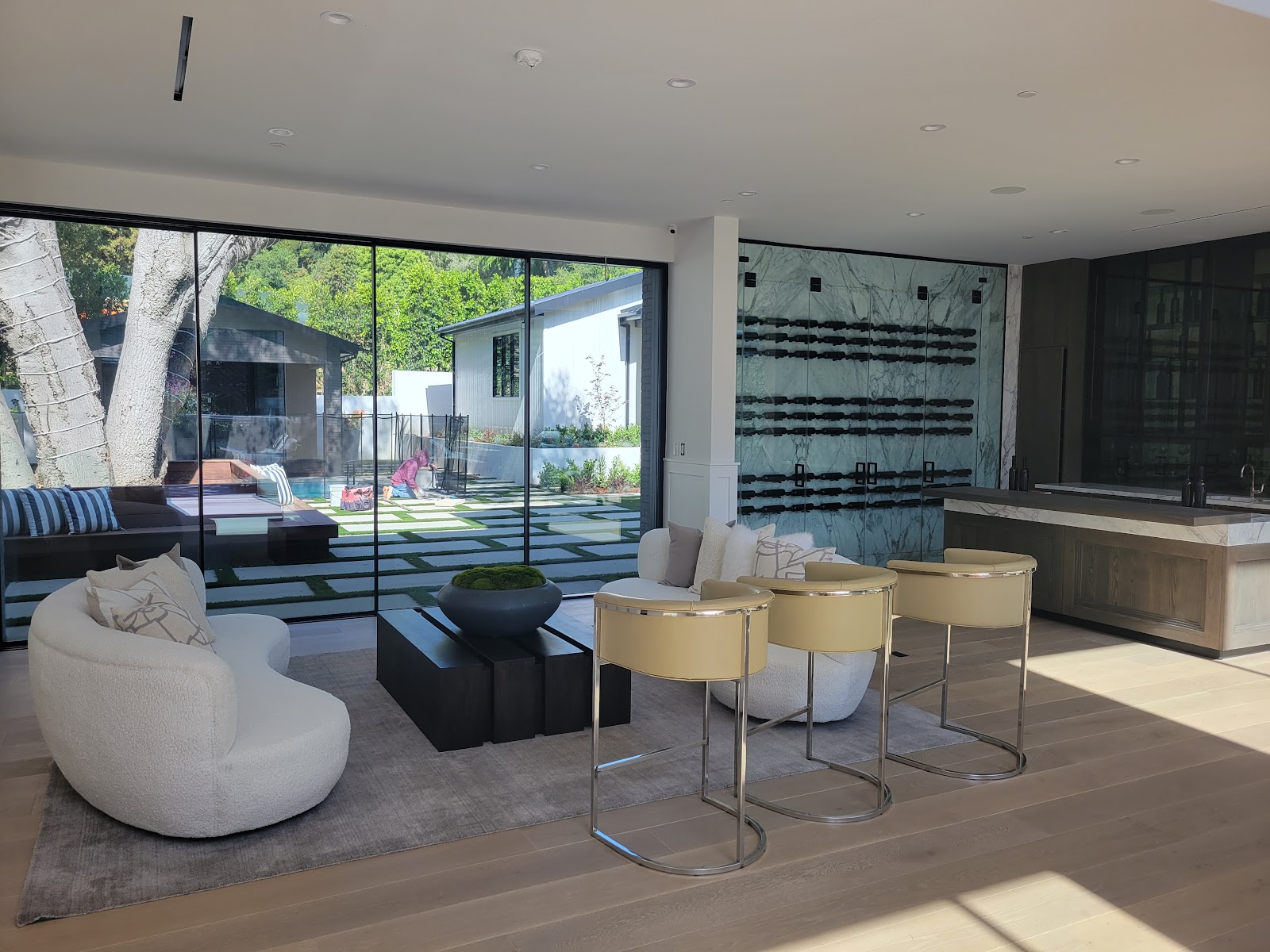 Furnished living room with full-height glazing — Boca de Canon custom home build in Brentwood, Los Angeles
