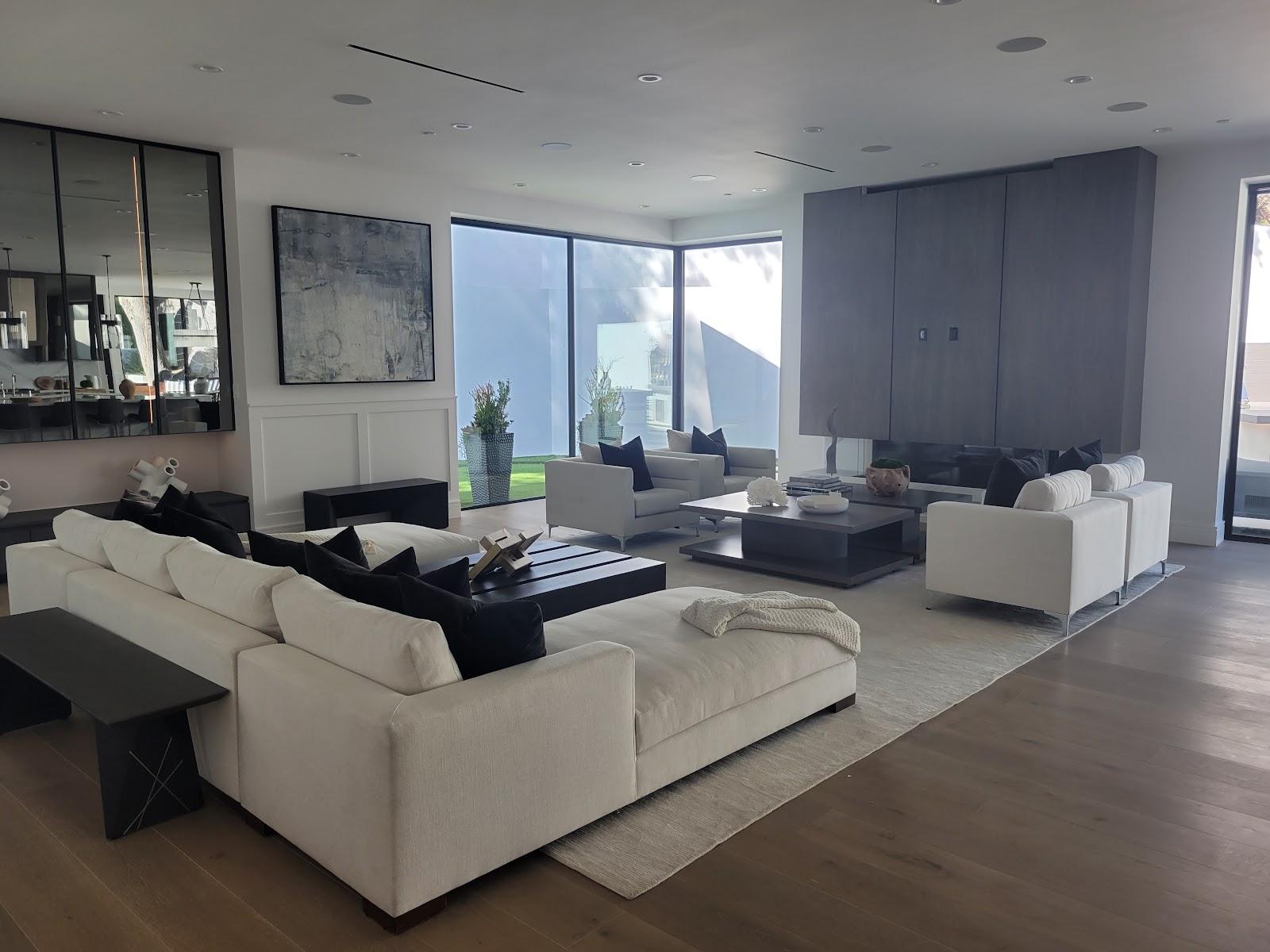 Great room seating area with wide-plank floors — Boca de Canon custom home build in Brentwood, Los Angeles
