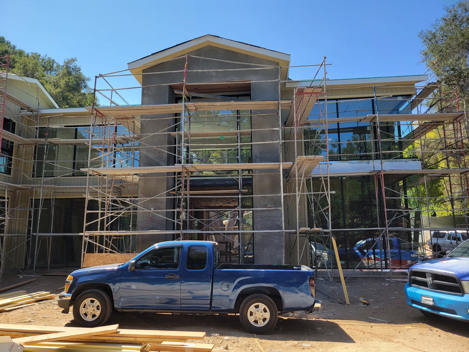 Scaffolding up for exterior finishes — Boca de Canon custom home build in Brentwood, Los Angeles