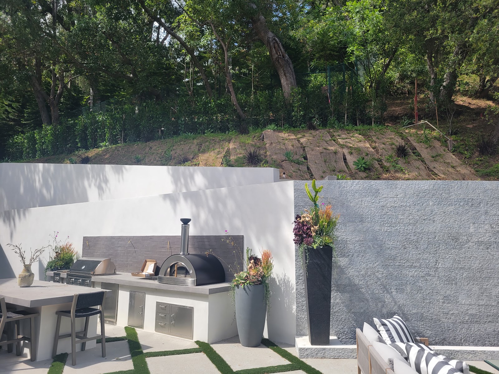 Built-in outdoor kitchen and barbecue counter — Boca de Canon custom home build in Brentwood, Los Angeles