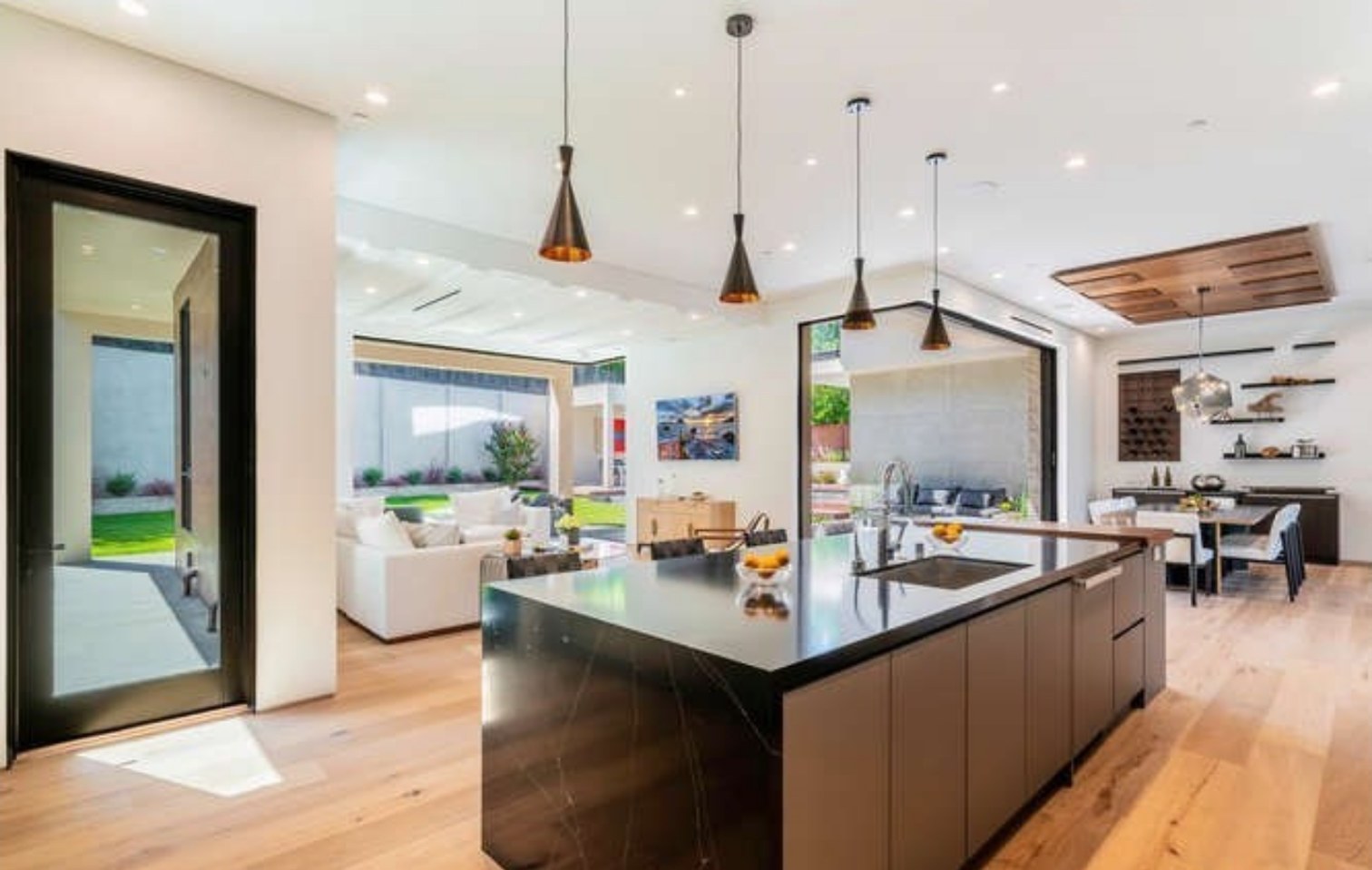 Remodeled Los Angeles kitchen with a stone island and custom cabinetry