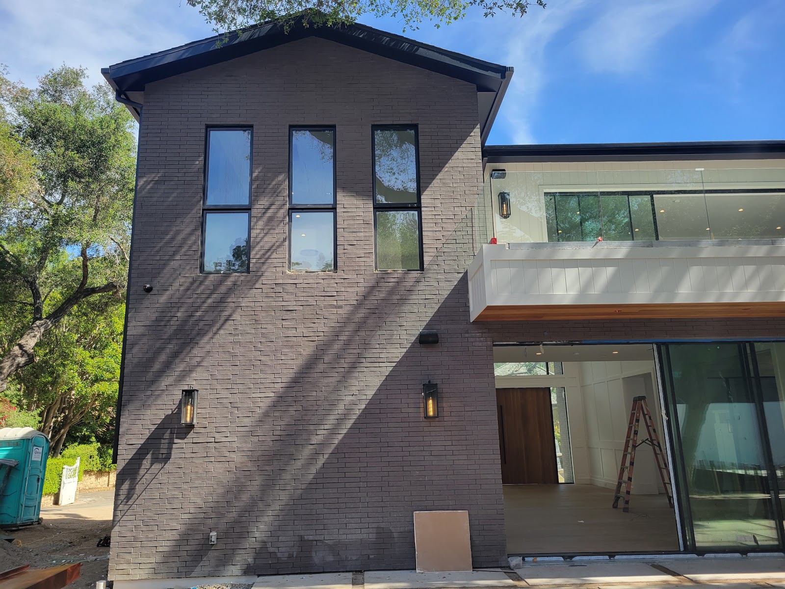 Modern board-formed and stucco elevation in Brentwood